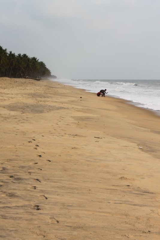 The locals seem to be taking pictures of the sea.